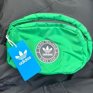 Brand New Adidas Fanny Pack Green. Very nice with a lot of storage.